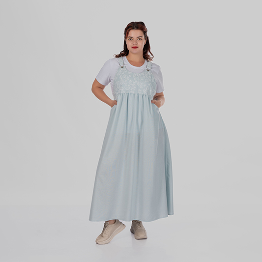 women's plus size linen pinafore dress with wide straps and a botanical print